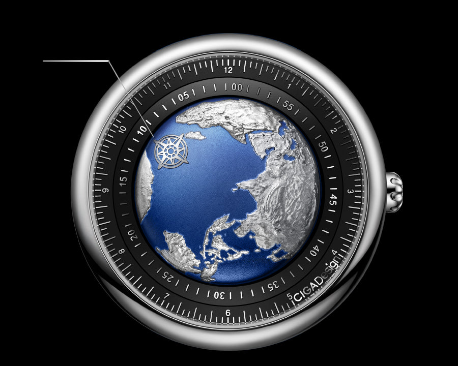 The Blue Planet watch worn on the wrist, showing the rubber strap and the relief dial in natural light.